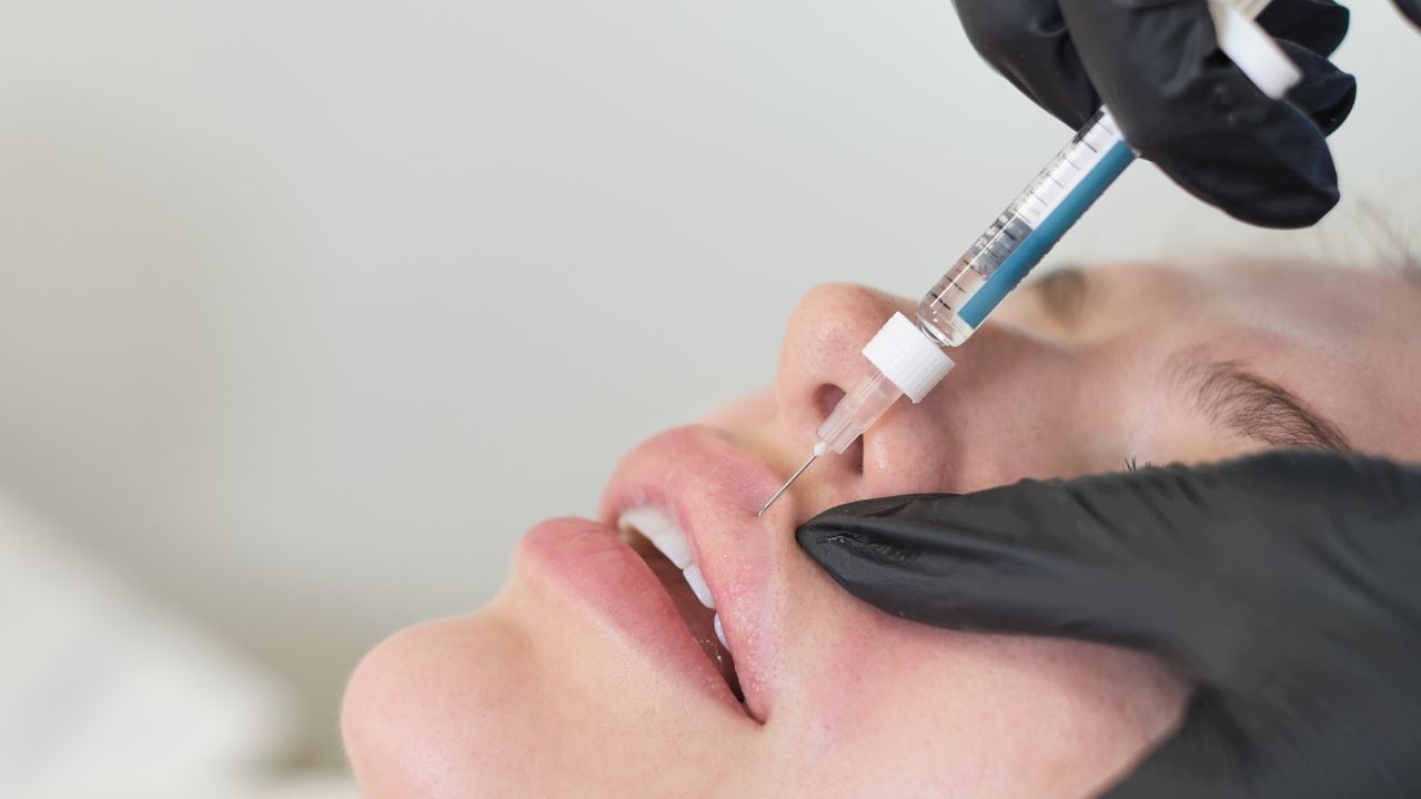 A woman receives lip fillers in Texas